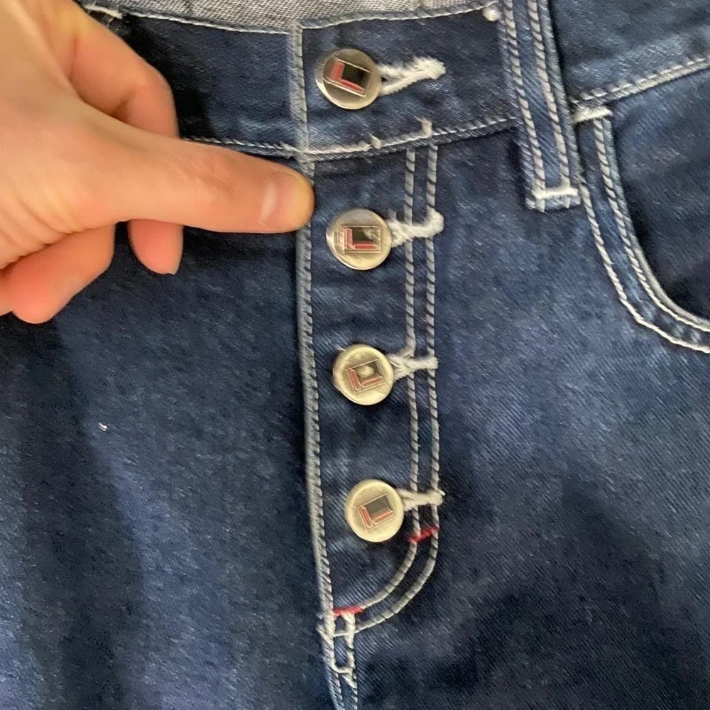 Vintage graphic logo Fubu bell bottoms jeans pants
